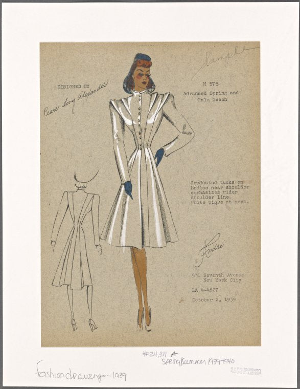 Coat with fitted waist and wide shoulders.
