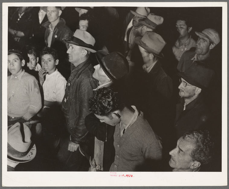 Street meeting at night in Mexican town outside of Shafter, California. Organizer for United Cannery Agricultural Packing and Allied Workers of America (Congress of Industrial Organizations-CIO) talks to mixed crowd. The strike failed