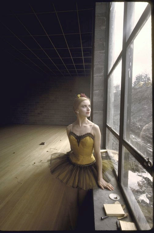 New York City Ballet dancer Violette Verdy poses in front of  the construction of the new Saratoga Performing Arts Center (Saratoga)