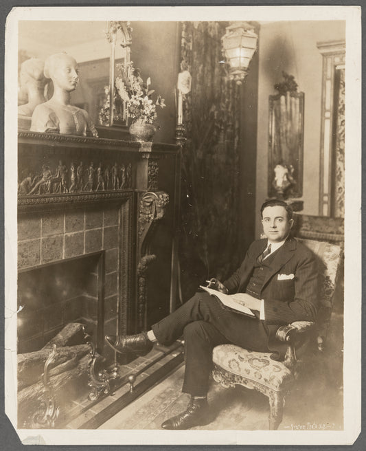 Julian Eltinge at home reading