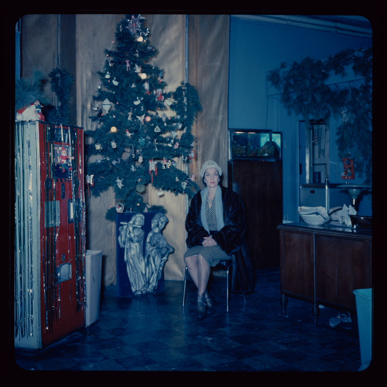 Lisan Kay and Yeichi Nimura with Christmas decorations, likely in their Carnegie Hall studio