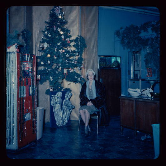 Lisan Kay and Yeichi Nimura with Christmas decorations, likely in their Carnegie Hall studio