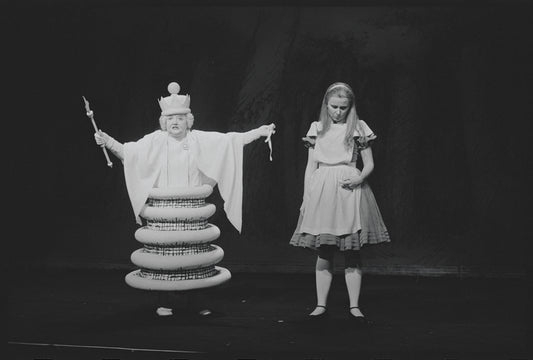 Kate Burton (as Alice) and Joan White (as White Queen) in the stage production Alice in Wonderland