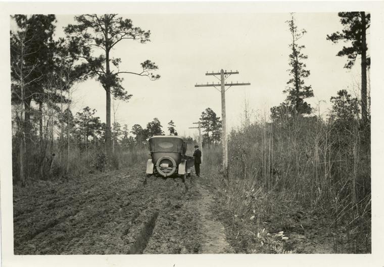 Car stuck in muddy road