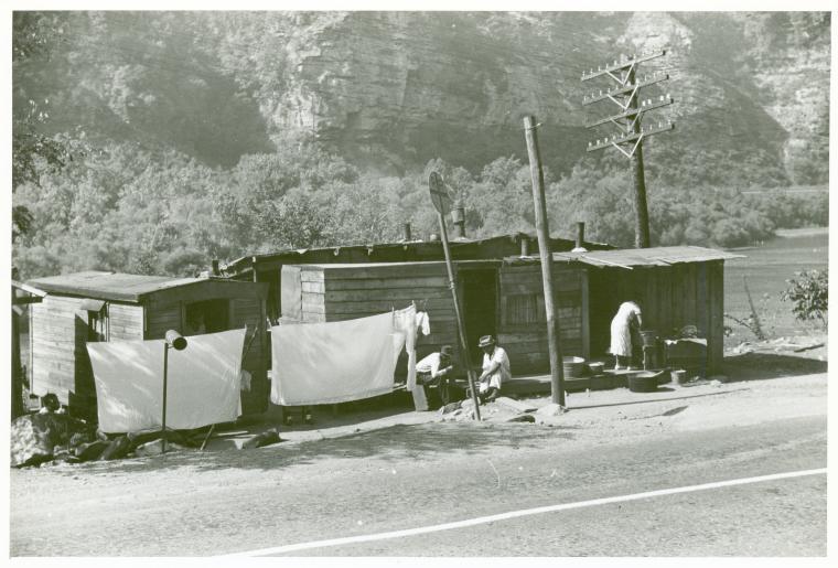Shacks inhabited by Negroes along highway between Charleston and Gauley Bridge, W. Va., Sept. 1938.