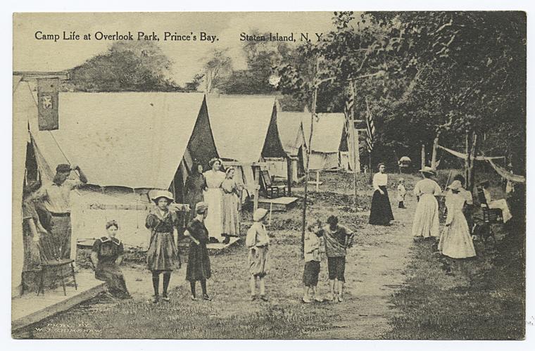 Camp Life at Overlook Park, Prince's(sic) Bay. Staten Island, N.Y. [people in old- fashioned garb standing and walking in front of tents.]