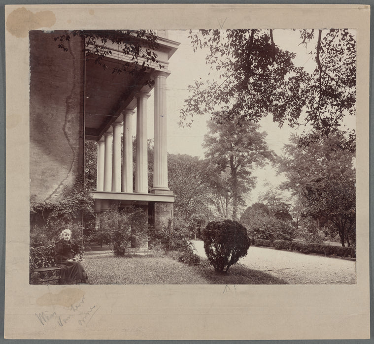 Miss Van Lew seated in front of the south portico of her home in Richmond, VA