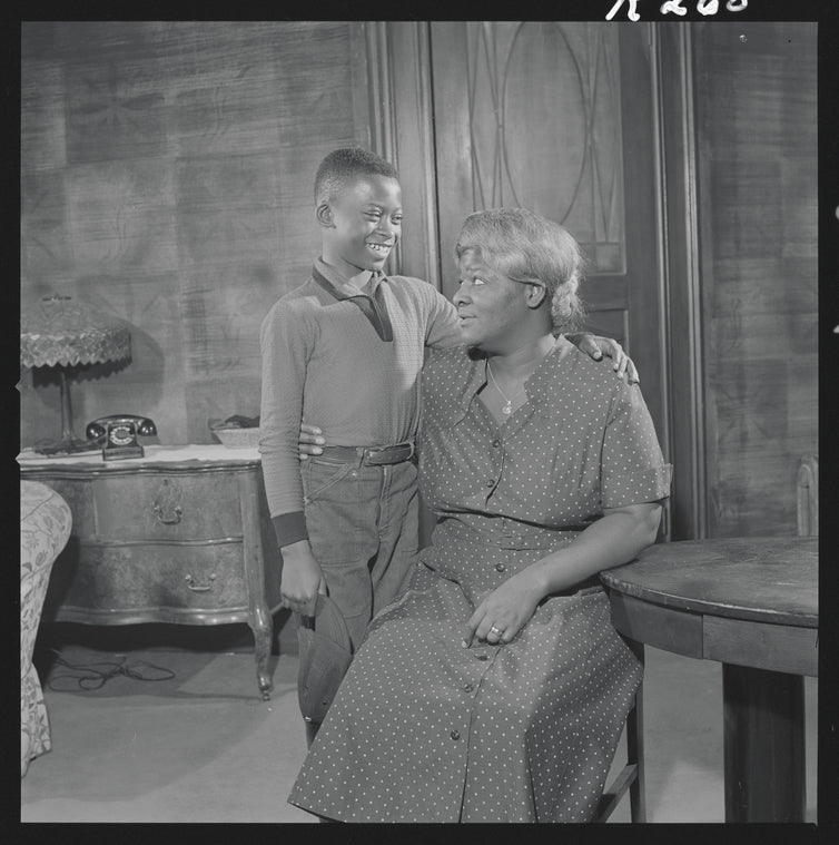 Charles Richardson and Claudia McNeil in the stage production A Raisin in the Sun
