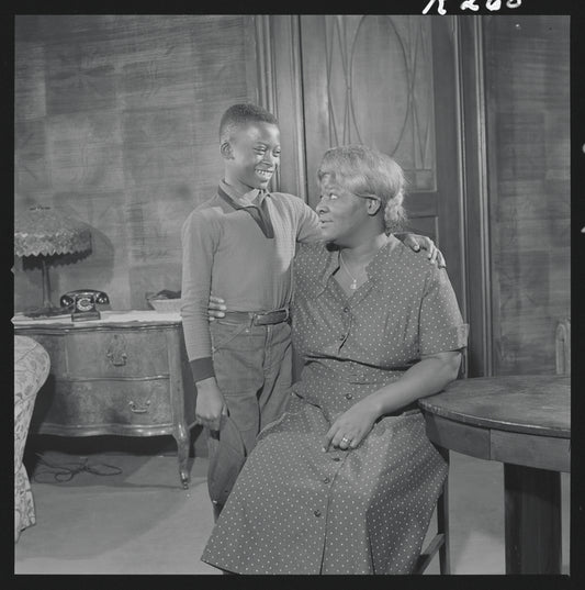 Charles Richardson and Claudia McNeil in the stage production A Raisin in the Sun