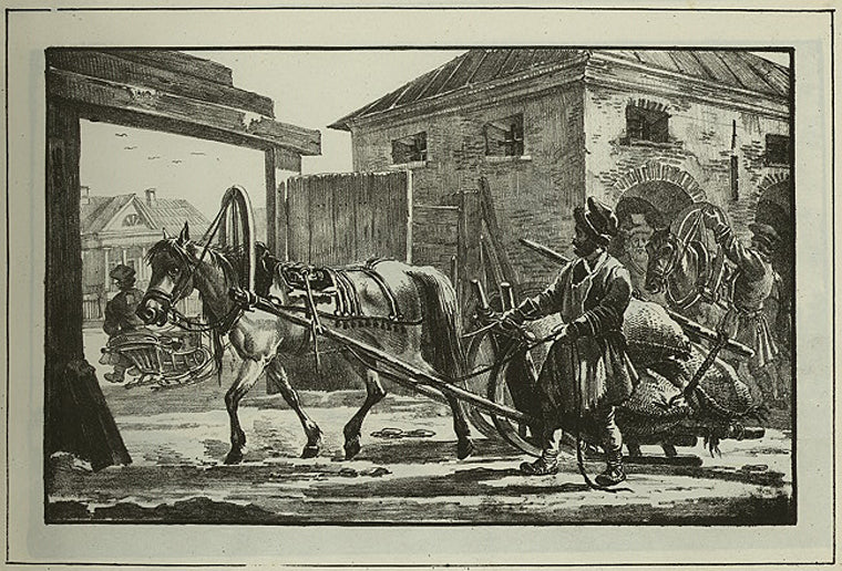Un portefaix transportan des sacs de farine, en hiver.