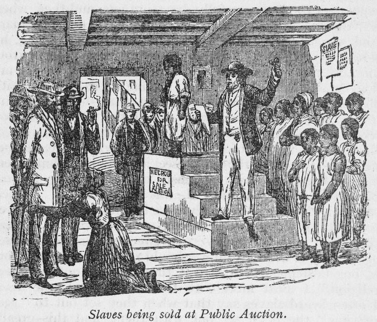 Slaves being sold at public auction.