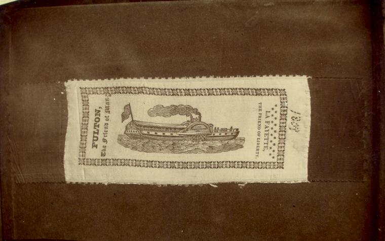 Photograph of badge worn on first trip of the LaFayette