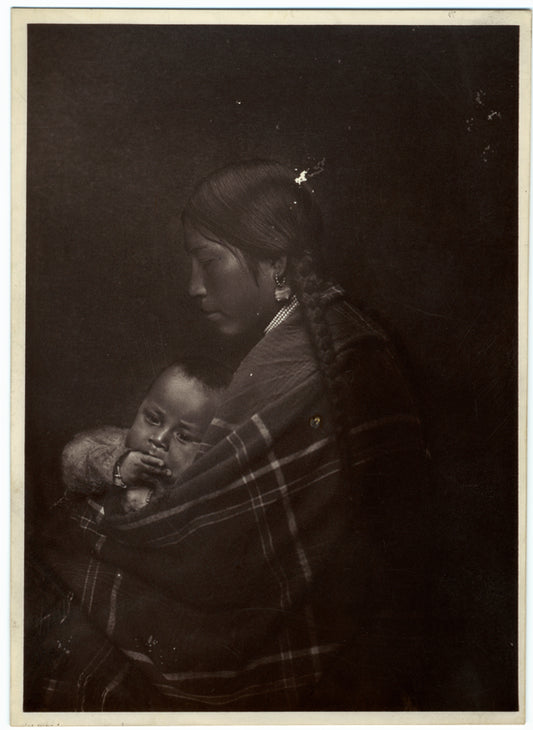 North American Indian woman holding infant