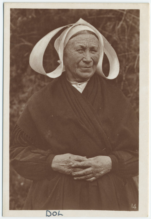 Woman in regional dress, Dol-de-Bretagne, France