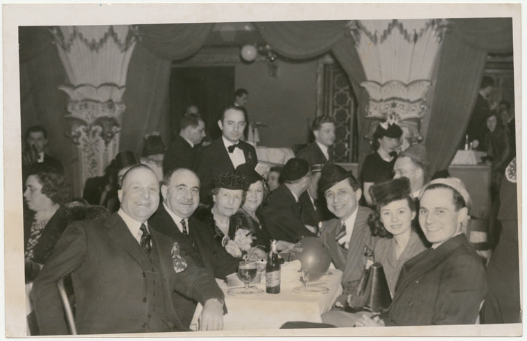 Clyde Hager, A. L. Hager, Mrs. A. L. Hager, Ole Olsen, Sally Bond, and Douglas Hagen dining at the nightclub Billy Rose's Diamond Horseshoe
