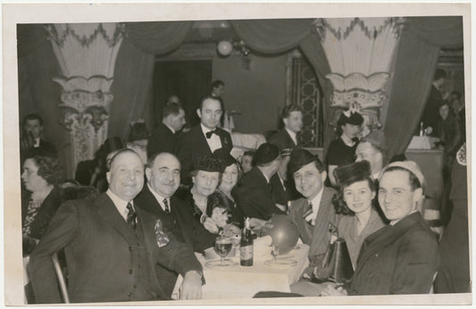 Clyde Hager, A. L. Hager, Mrs. A. L. Hager, Ole Olsen, Sally Bond, and Douglas Hagen dining at the nightclub Billy Rose's Diamond Horseshoe