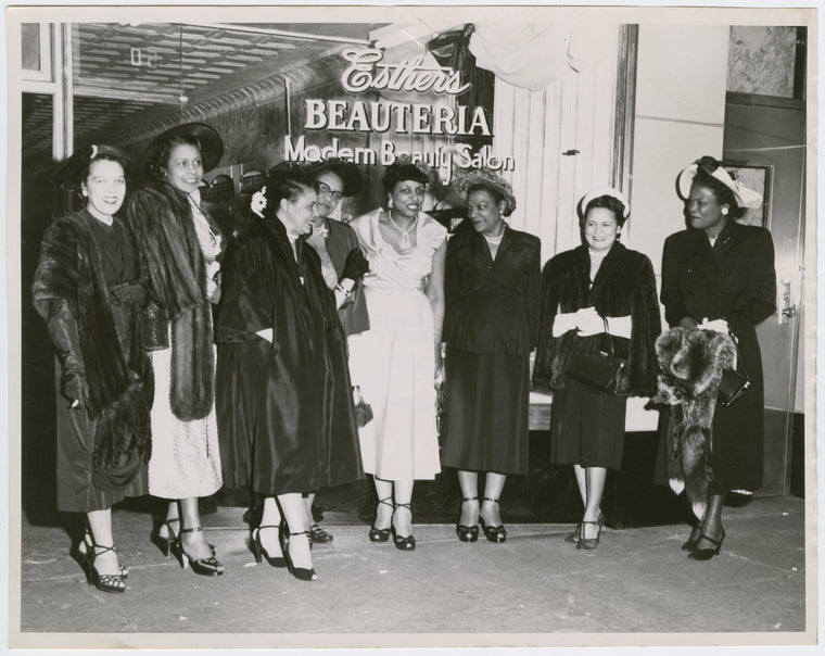 Esther Parham with guests at the opening of Esther's Beauteria Modern Beauty Salon