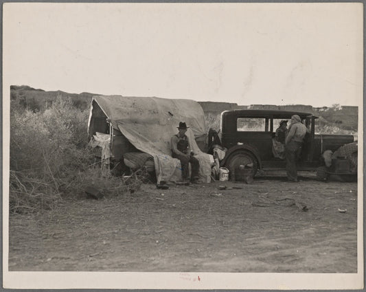 California migratory farm laborers-drought refugees from Oklahoma-camped in the brush on the river bottom with no water or sanitation. On the outskirts of Brawley, Imperial Valley, Calif.