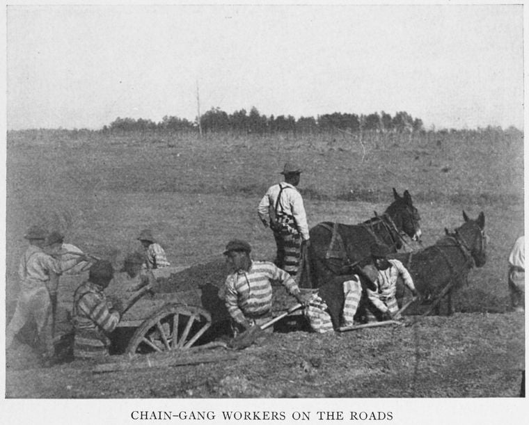 Chain - gang workers on the roads.