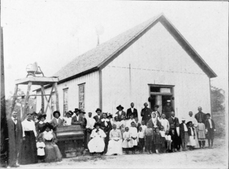 Wiley Homer, his people and Chapel at Grant, 1904.