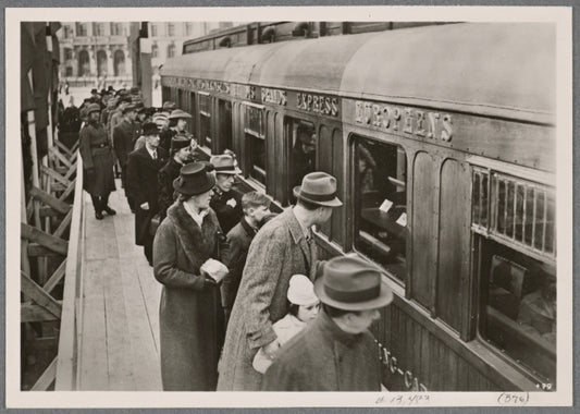 Armed Forces Day, 1942.  For a donation to the Winter Relief, one could see the historic railway carriage from Compiegne in which the Armistice was concluded between Germany and a defeated France in Summer 1940.  These Berliners showed great interest.