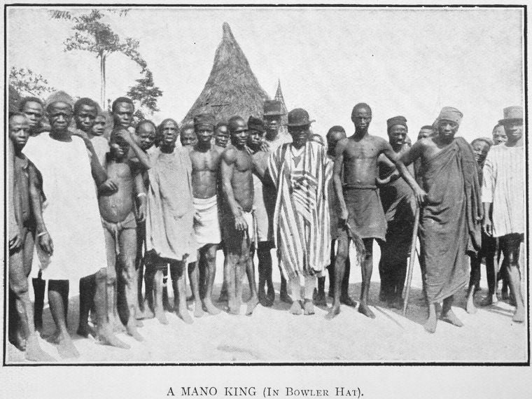 A Mano King [in bowler hat.]