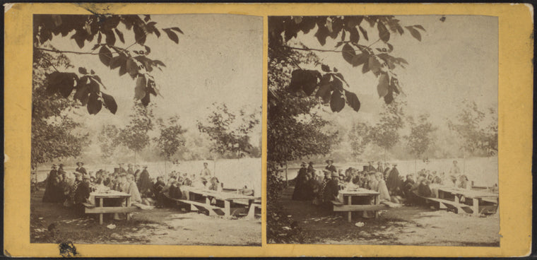 Group portraits of picnickers.