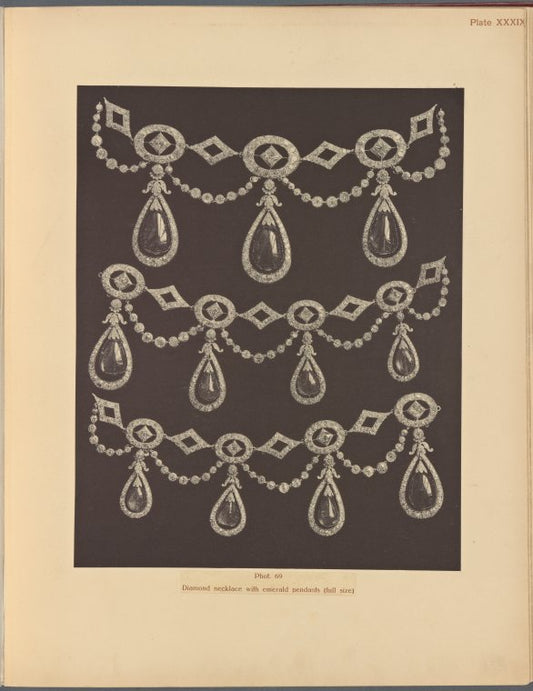 Diamond necklace with emerald pendants.