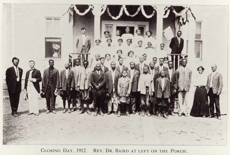 Closing day, 1912. Rev Dr. Baird at left on the porch.
