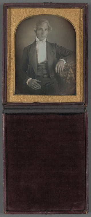 Portrait of a man wearing patterned bowtie