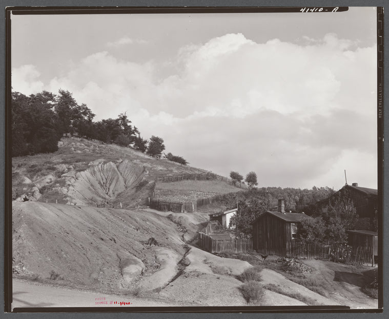House and ancient slagpile in Coal Hollow, Pennsylvania, about twelve miles south of Saint Mary's Pennsylvania.