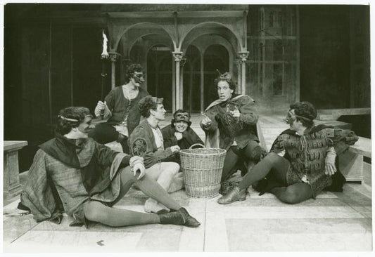 Paul Rudd (seated center background), Ray Wise (seated center background), and David Rounds (kneeling center background) in the stage production Romeo and Juliet
