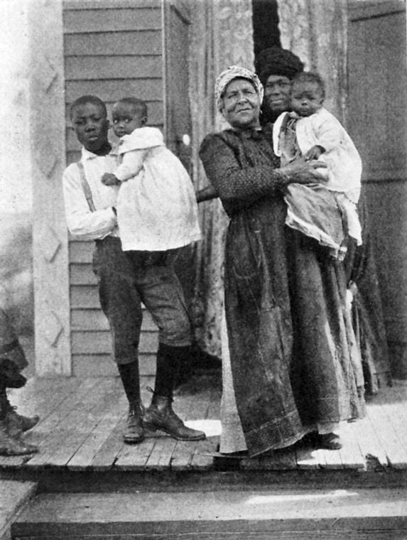 Three generations of Louisiana negroes; Grandmother can only talk Creole French; mother talks French and English; boy only talks English.