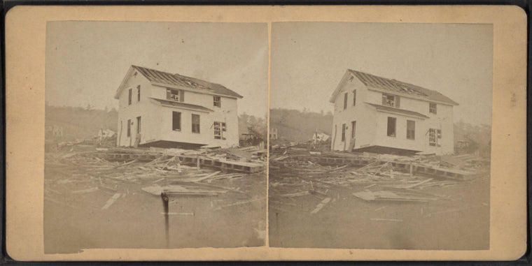 View of a house that has been lifted off its foundation.