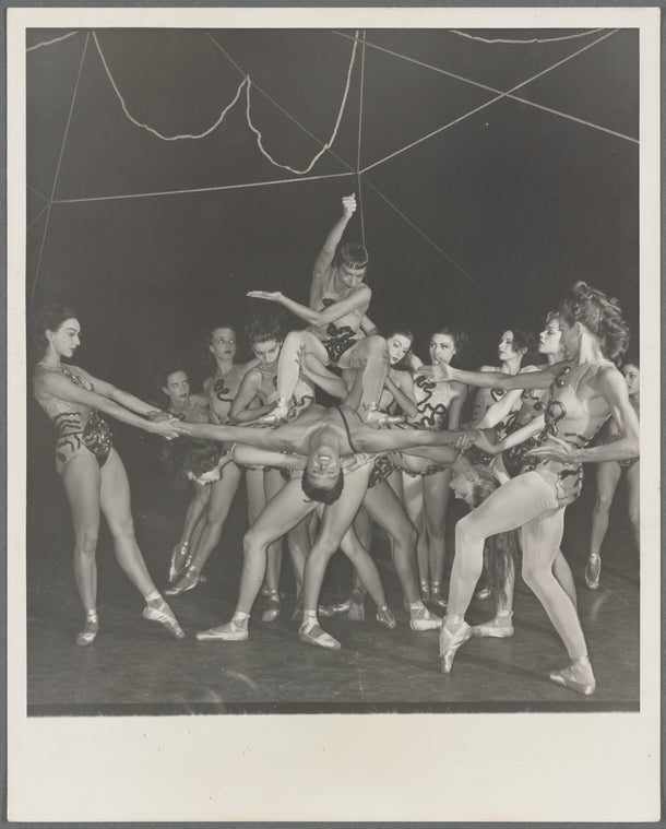 Nora Kaye and Nicholas Magallanes (center) surrounded by female dancers