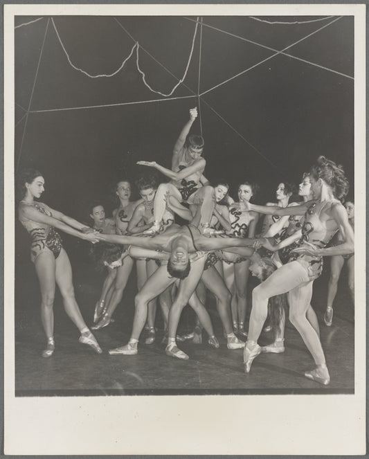 Nora Kaye and Nicholas Magallanes (center) surrounded by female dancers
