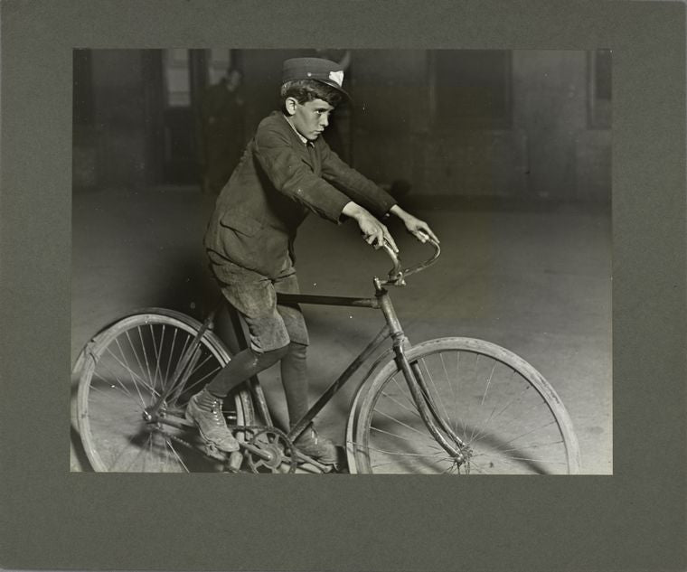 A telegraph messenger boyworking at 10 p.m., August 1908