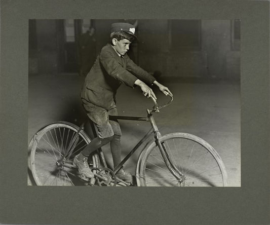 A telegraph messenger boyworking at 10 p.m., August 1908