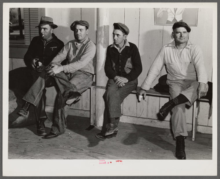 Spanish muskrat trappers waiting in dance hall during fur auction sale. Delacroix Island, Louisiana.