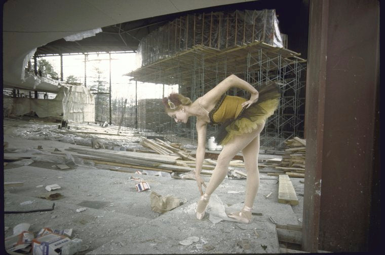 New York City Ballet dancer Violette Verdy poses amidst the construction of the new Saratoga Performing Arts Center (Saratoga)