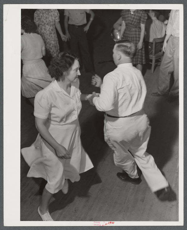 County superintendent at square dance party during school pie supper near Jackson, Kentucky.