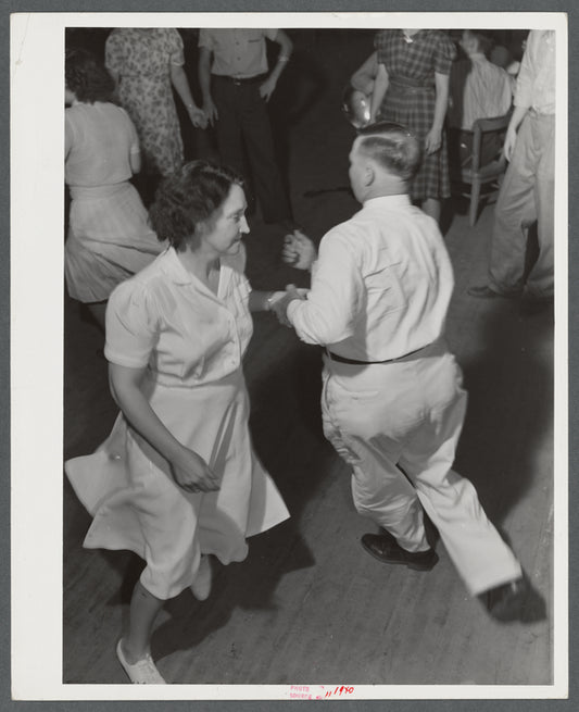 County superintendent at square dance party during school pie supper near Jackson, Kentucky.