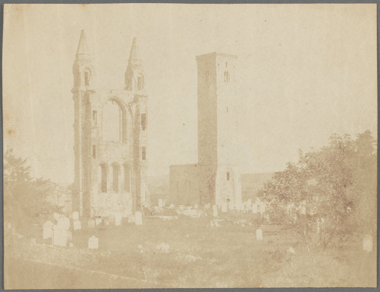 Ruins of a church façade, bell tower and graveyard