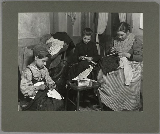 Mrs. Battaglia, Tessie, 12, and Tony, 7... finishing men's trousers, January 1908