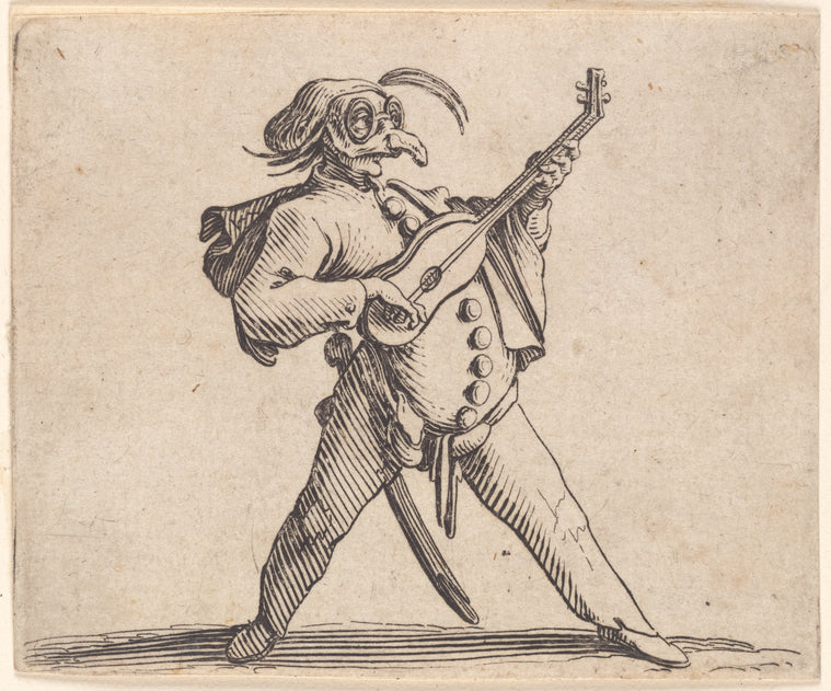Le comédien masqué, avec lunettes, et jouant de la guitare