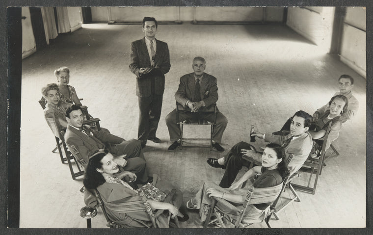 Jacob's Pillow Dance Festival Company seated together in a semicircle