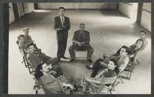 Jacob's Pillow Dance Festival Company seated together in a semicircle
