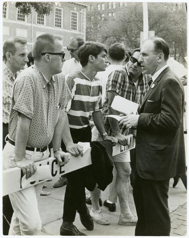 Frank Kameny talking with spectators