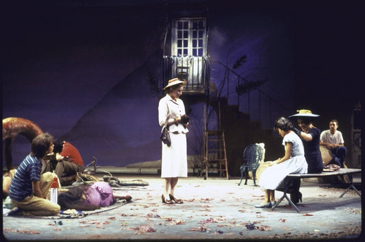 Actress Frances Conroy (C, standing) with cast members in a scene from the Lincoln Center Theater production of the play "In The Summer House." (New York)