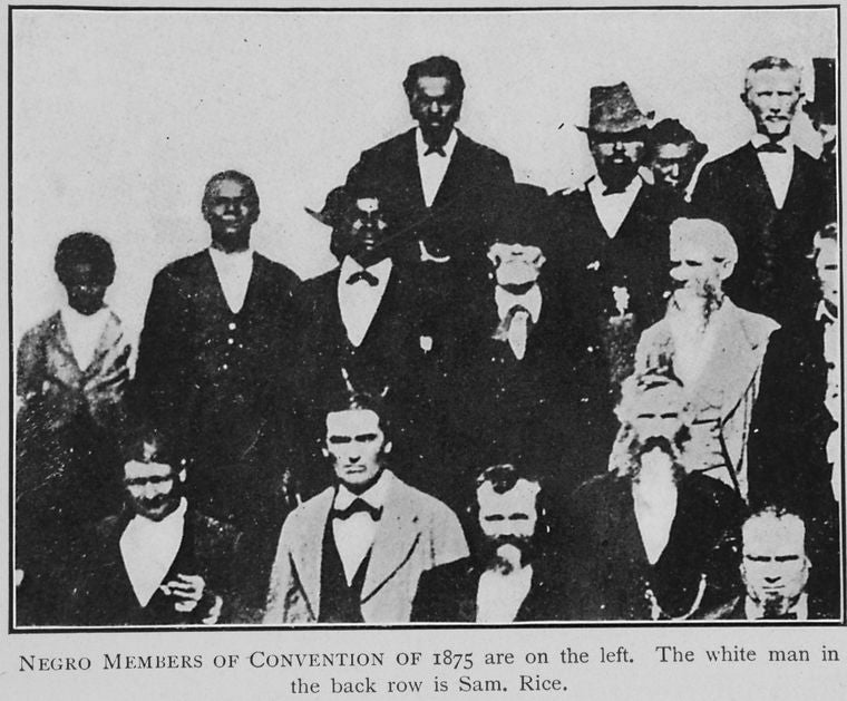 Negro members of Convention of 1875 are on the left.  The White man in the back row is Sam Rice.